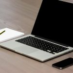 Free Silver Macbook Beside Iphone Stock Photo